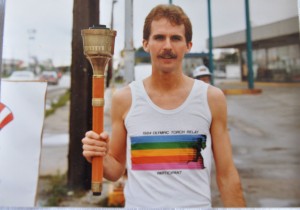 Man Holding the Olympic Torch