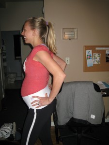 pregnant woman in support belt