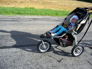 kid in jogging stroller