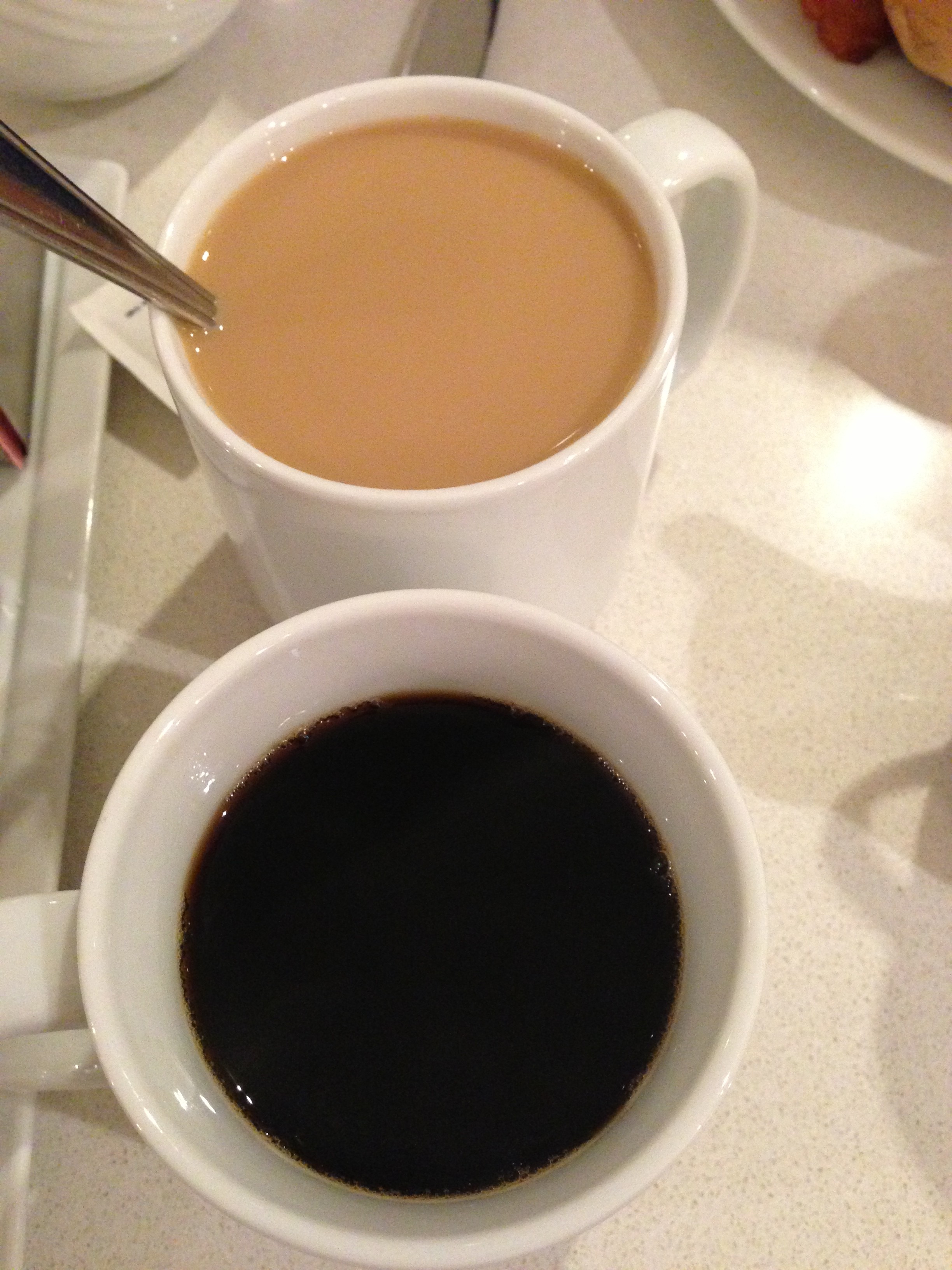 black coffee and creamer coffee